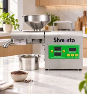 Shreesto Small Oil Machine compact cold press oil maker on a kitchen counter